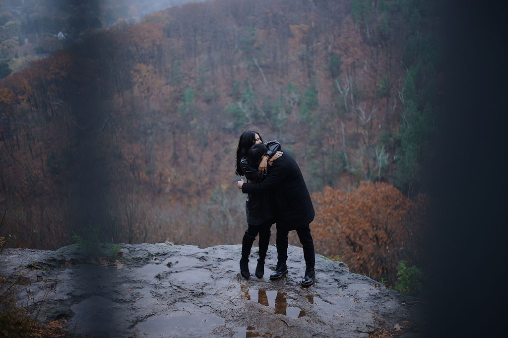 Distant couple in the misty clearing