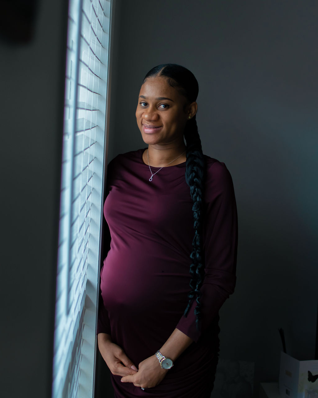 Maternity portrait in soft window light
