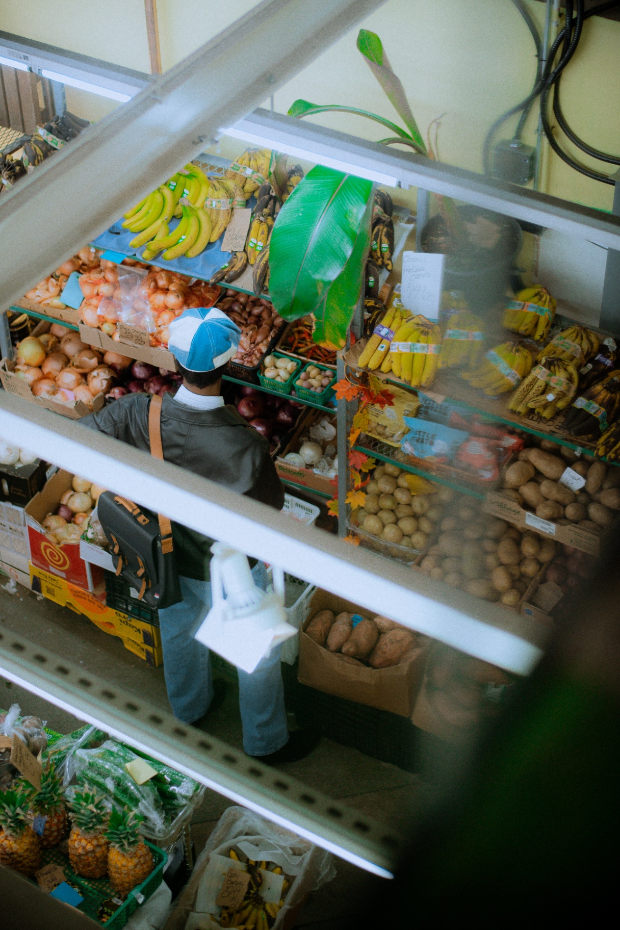 Browsing bananas and root vegetables at the corner market