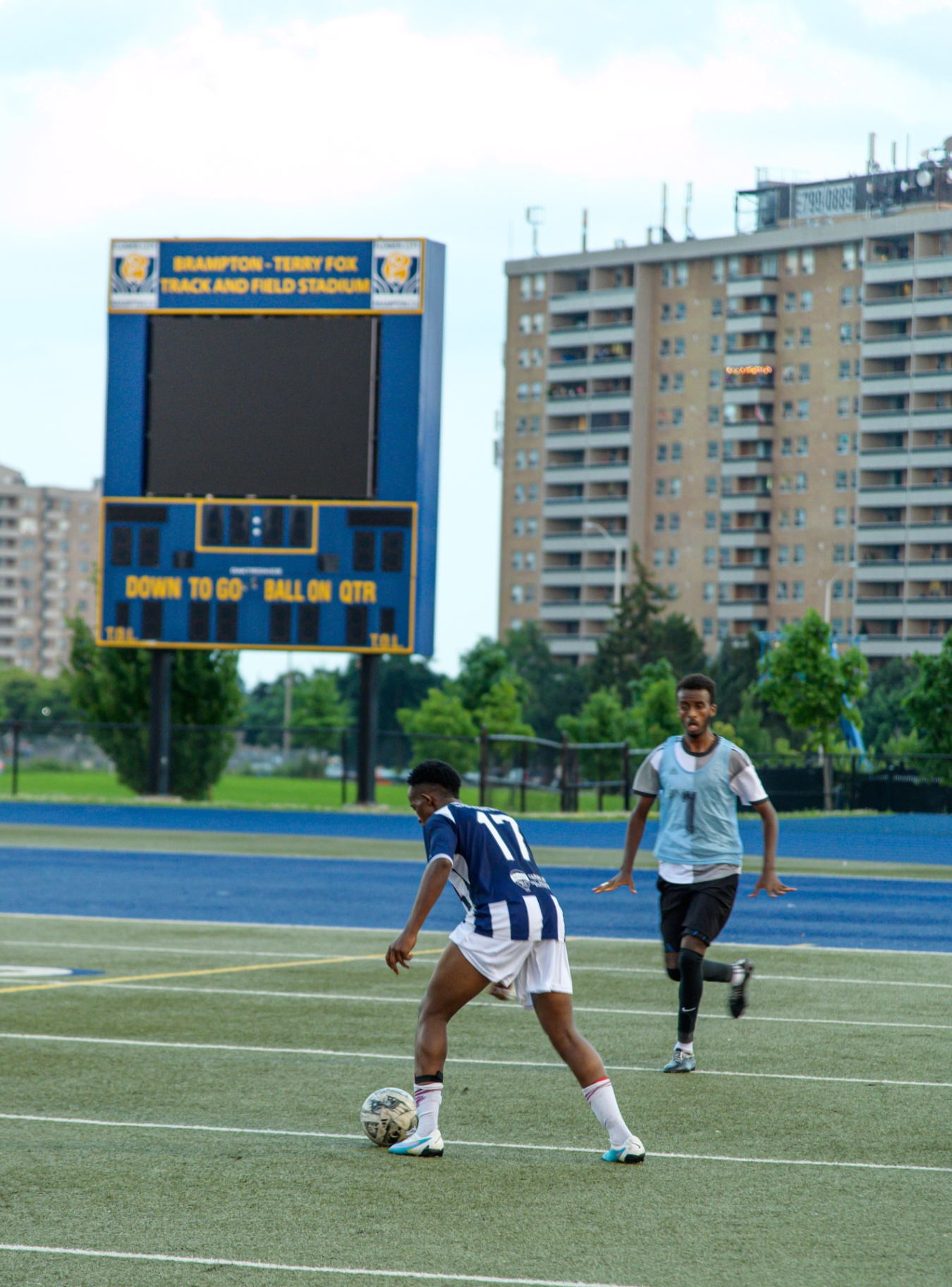 Winger #17 taking on a defender at Brampton Terry Fox
