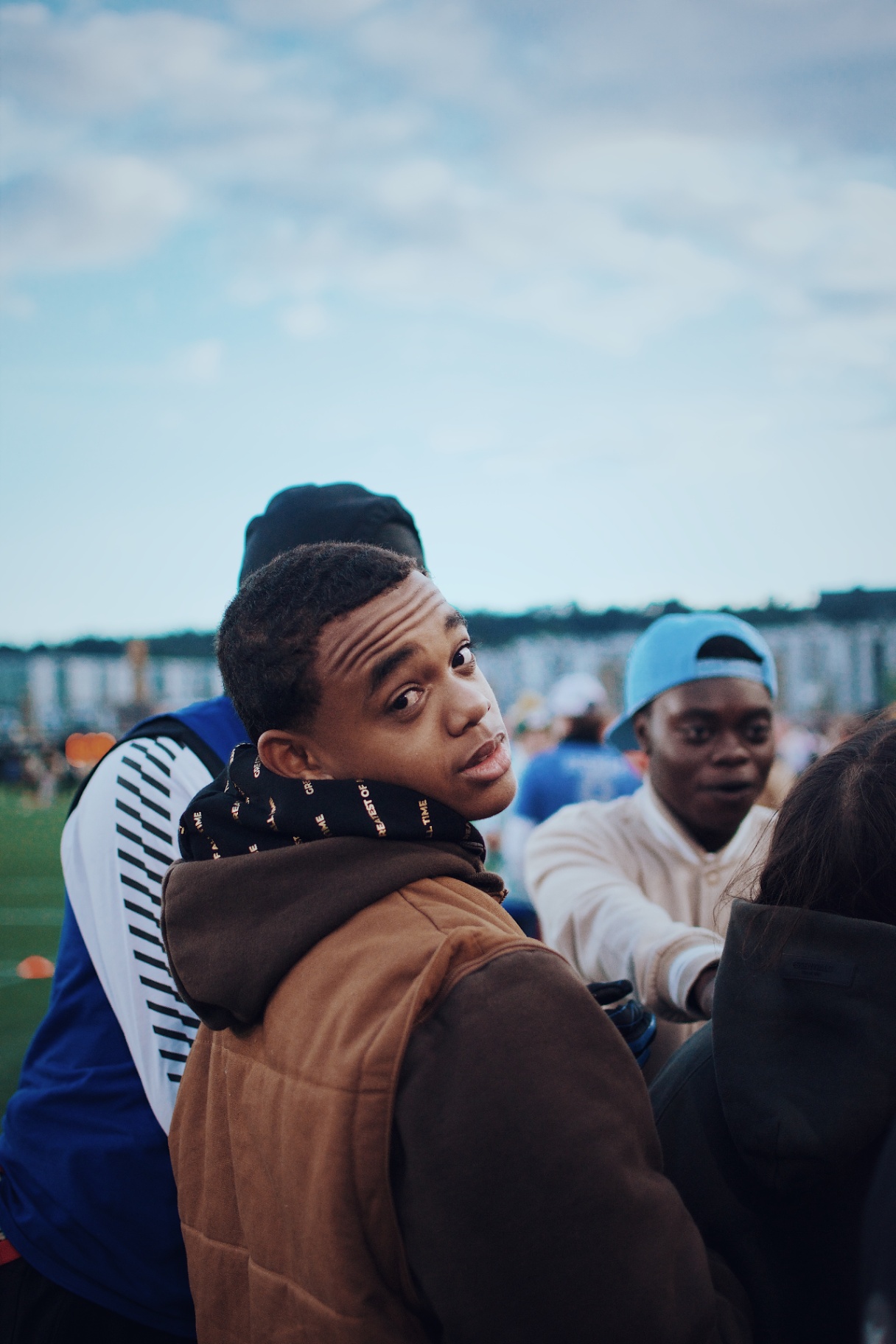 Candid portrait of a fan looking back in the stands