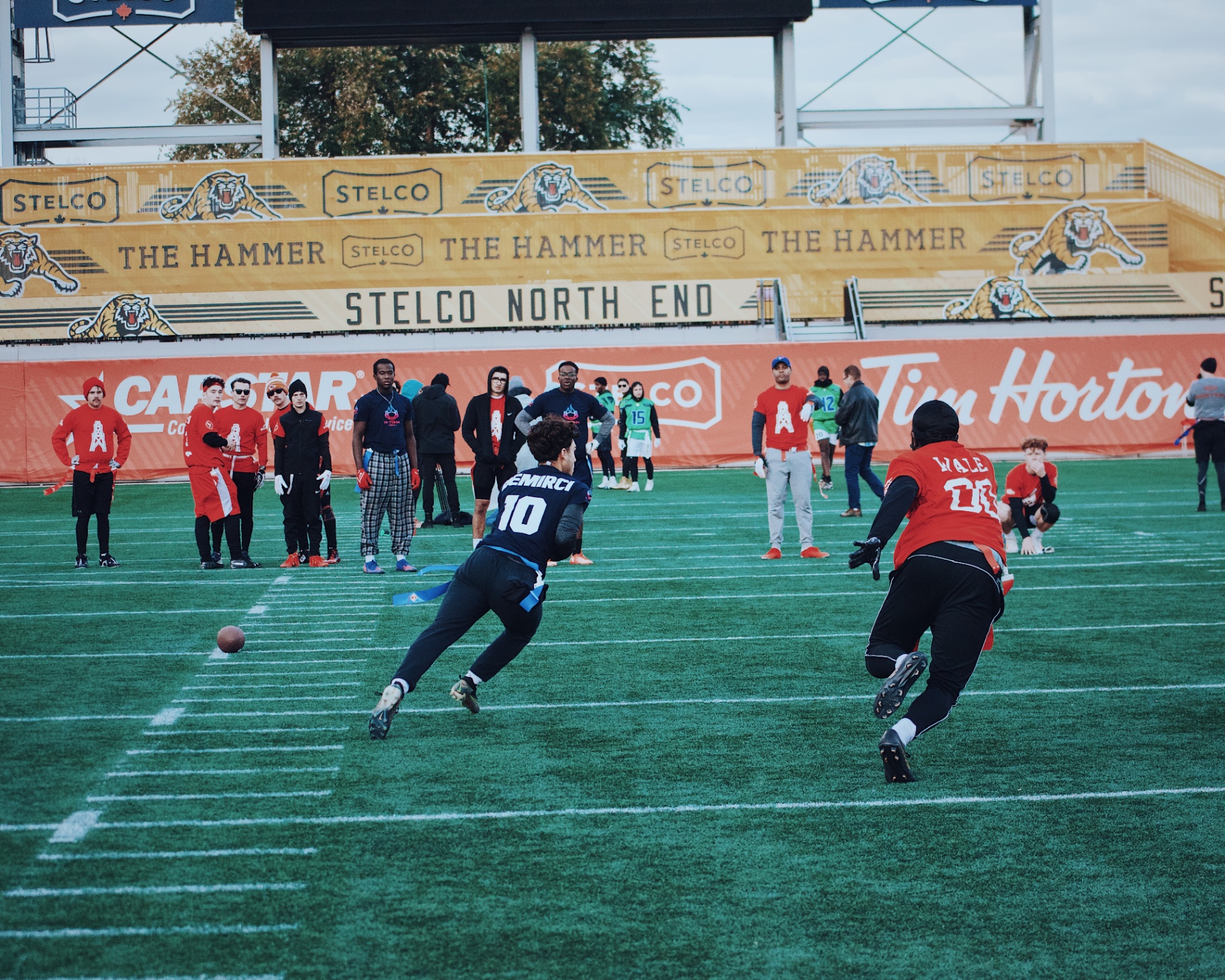 Receiver breaking on the ball in the open field