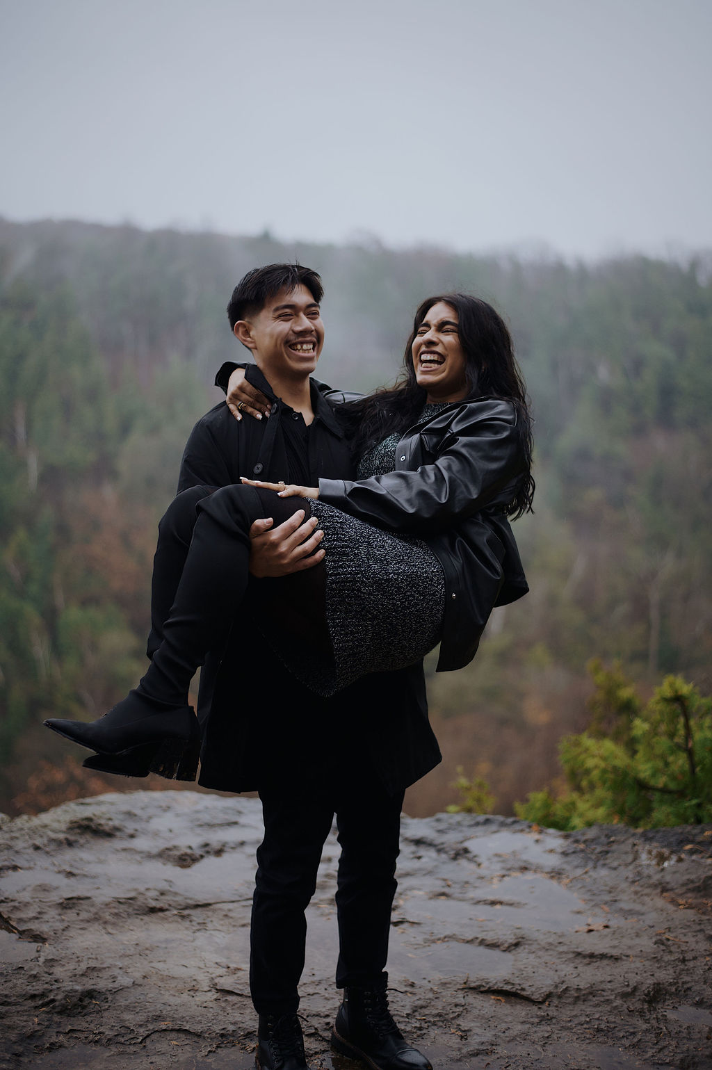 Embracing in a misty autumn forest