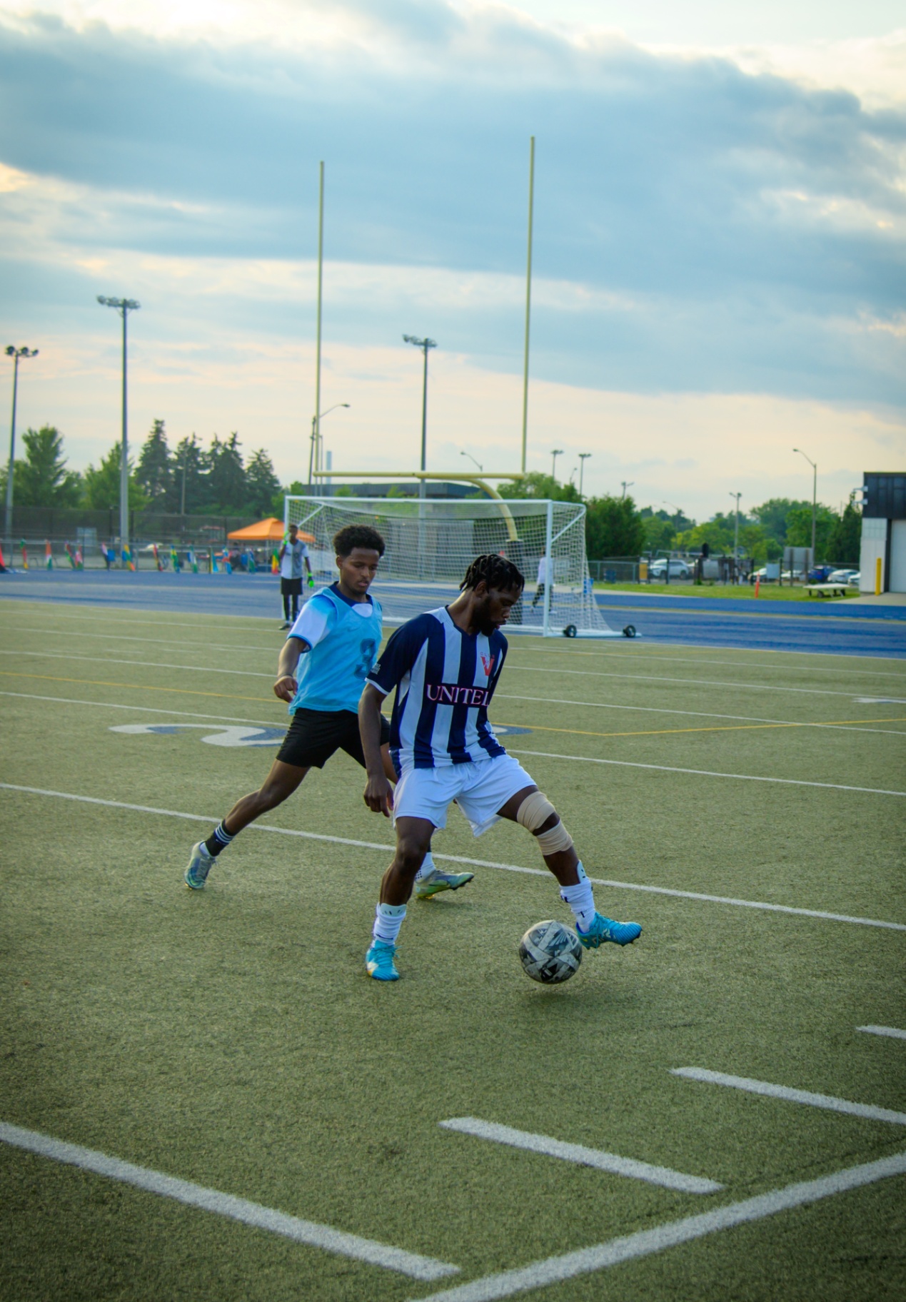 Forward shielding the ball on the turn