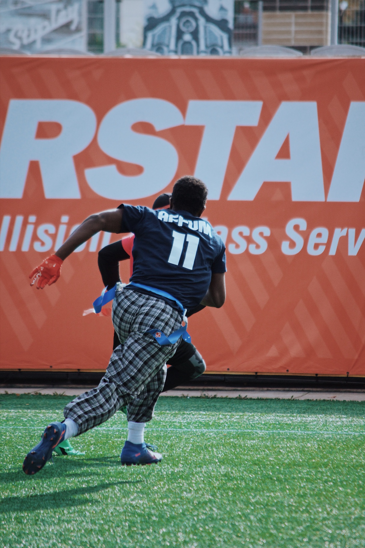 Flag football receiver #11 breaking upfield
