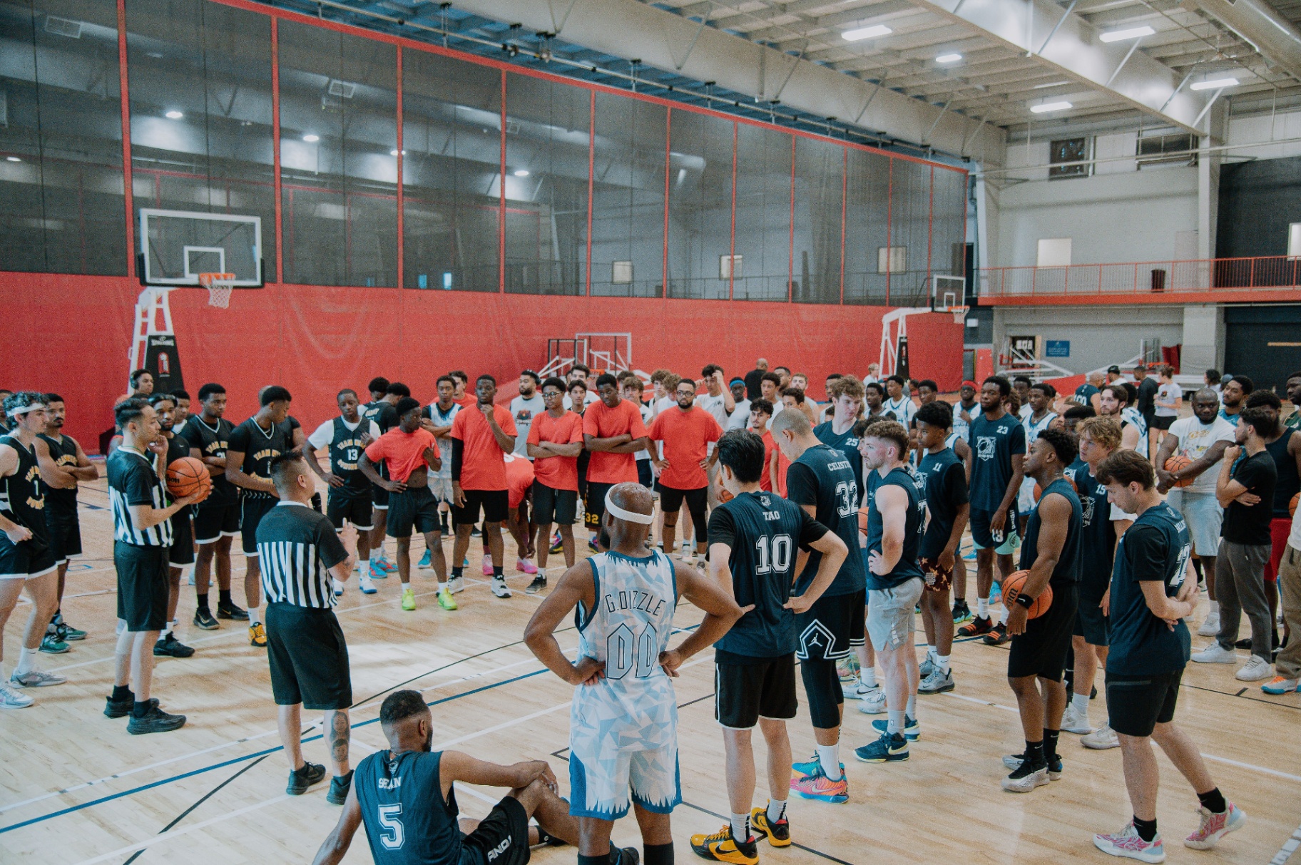 League-wide gathering at center court before tip-off