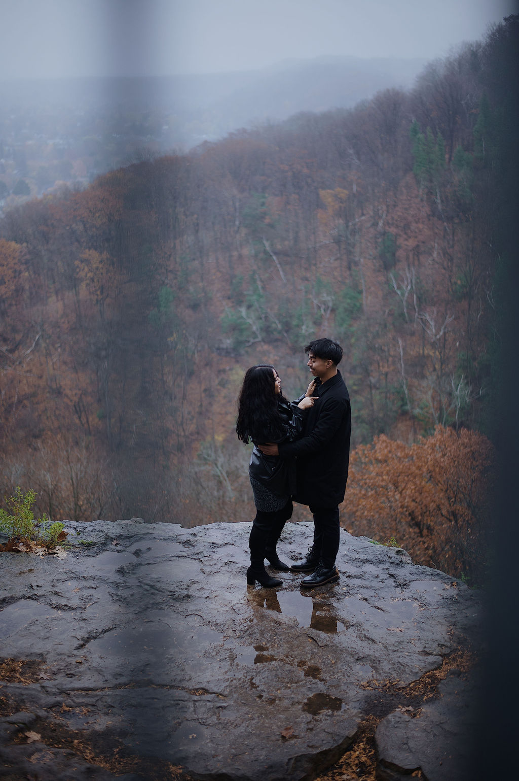 Embrace against the mountain backdrop