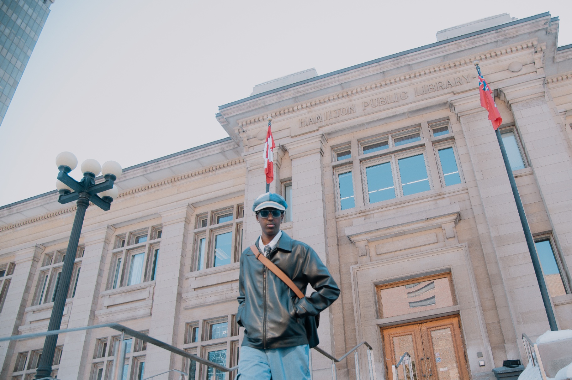 Street portrait in front of the Hamilton Public Library facade