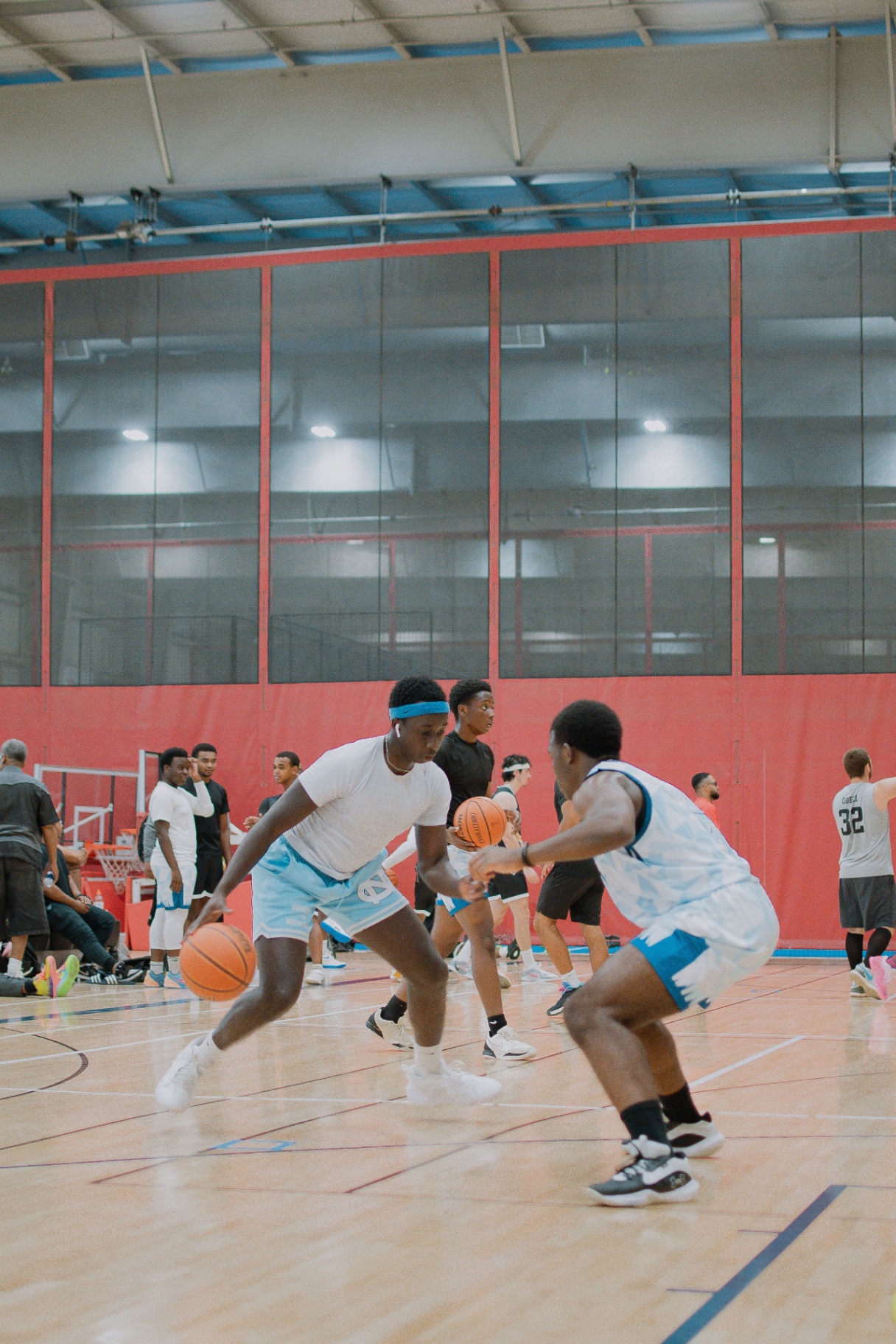 Ball-handler squaring up his defender at half court
