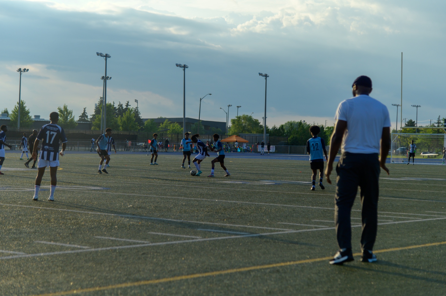 Wide view of the match at sunset